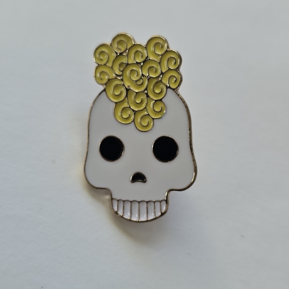 Skull Enamel Pin with Yellow Swirls